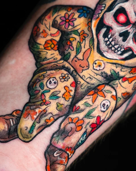 Detail of the floral patterns and smaller dolls in the matryoshka tattoo. Artwork by William Martz.