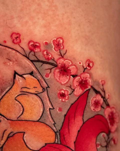 Close view of the blossoms and fox faces. Artwork by William Martz.