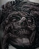 Close view of the grinning skull portrait and flowing hair. Artwork by William Martz.