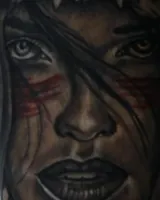Close view of the warrior portrait, face markings and windswept hair. Artwork by William Martz.