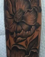 Side angle of the flower and leaves following the forearm. Artwork by William Martz.
