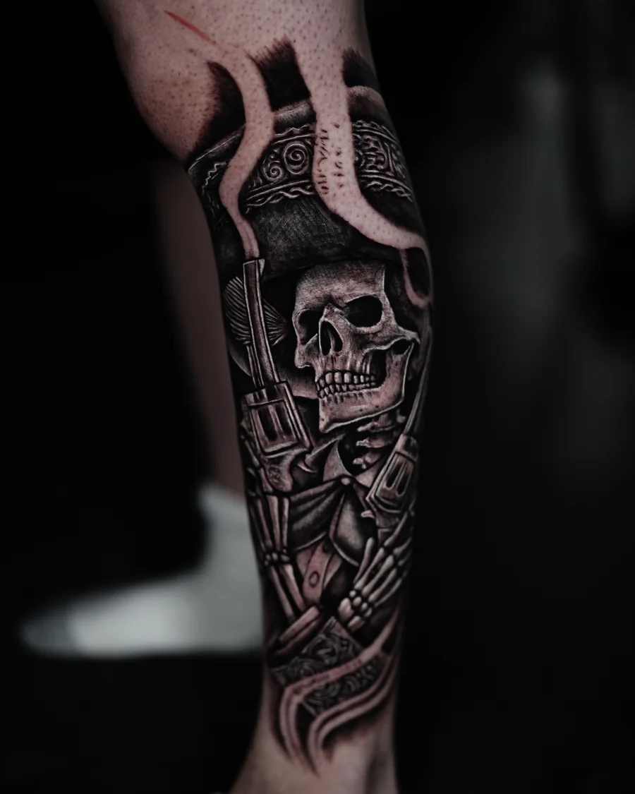 A black-and-gray forearm tattoo of a skull warrior wearing an ornate horned samurai helmet and armor.