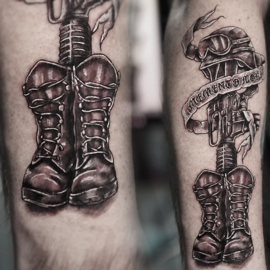 Two views of a black-and-grey memorial tattoo showing combat boots, a rifle, a helmet and a Memento Mori banner honoring fallen comrades.
