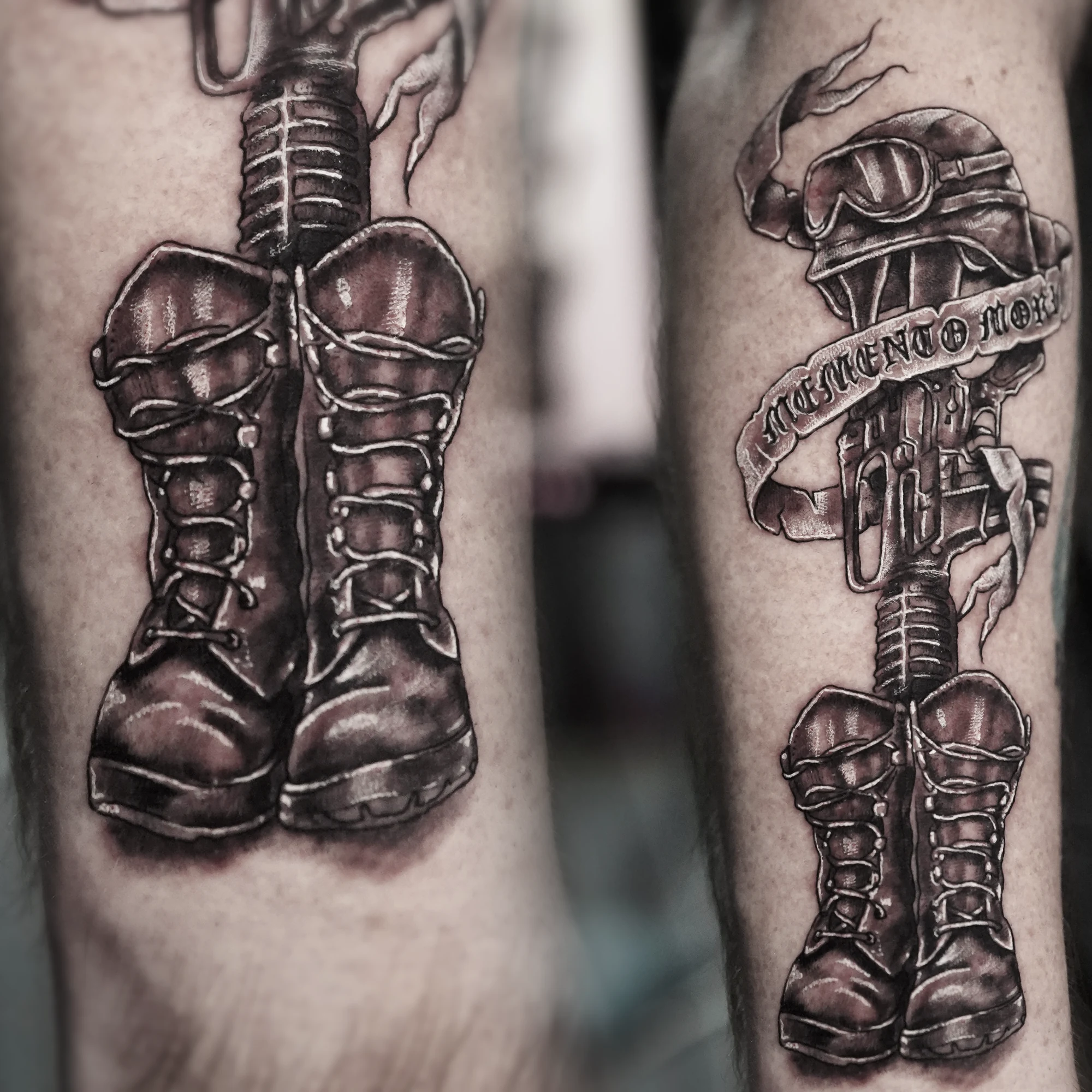 Two views of a black-and-grey memorial tattoo showing combat boots, a rifle, a helmet with goggles and a Memento Mori banner.